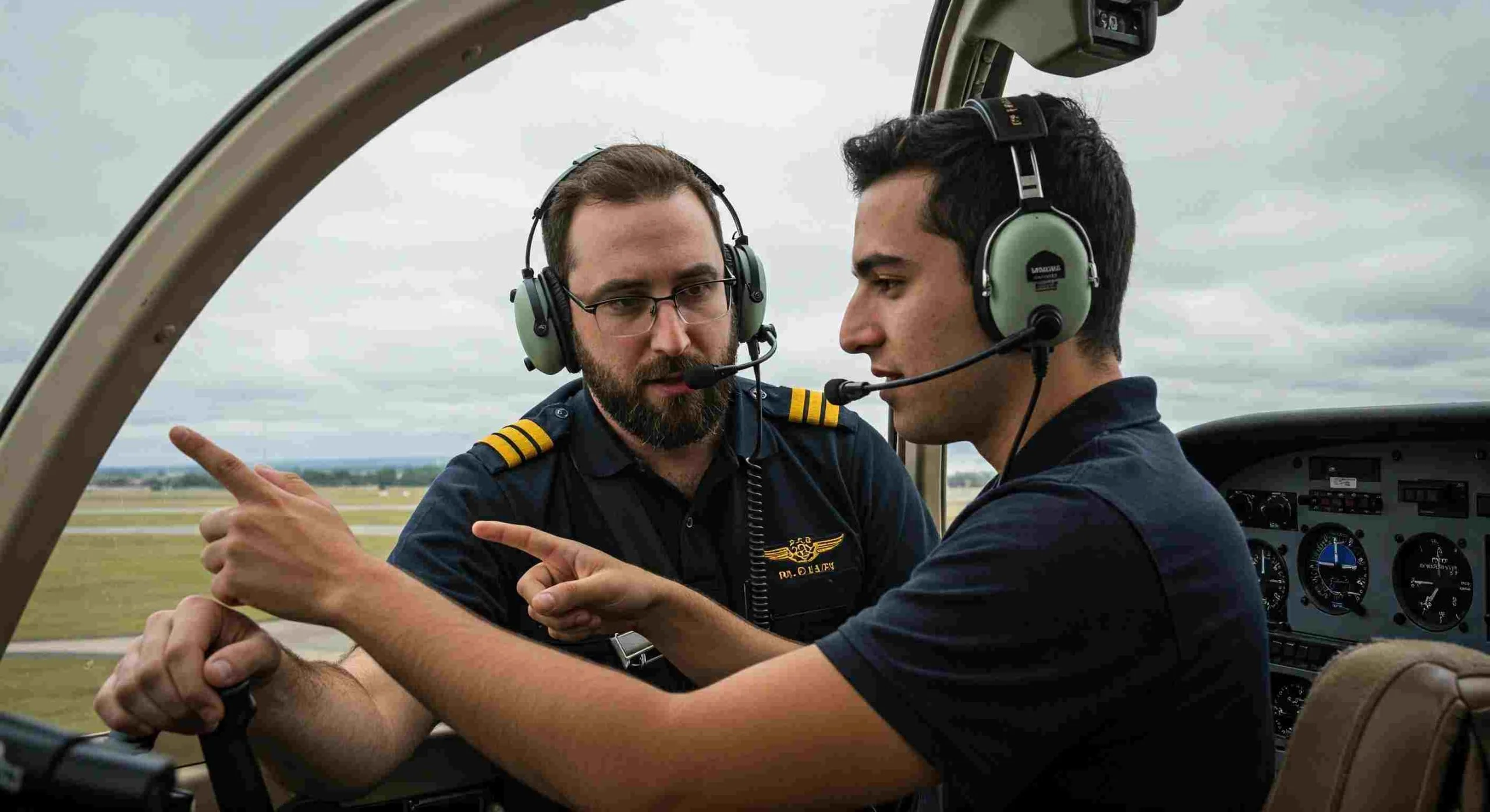 Flight instructor teaching a student pilot during a training session